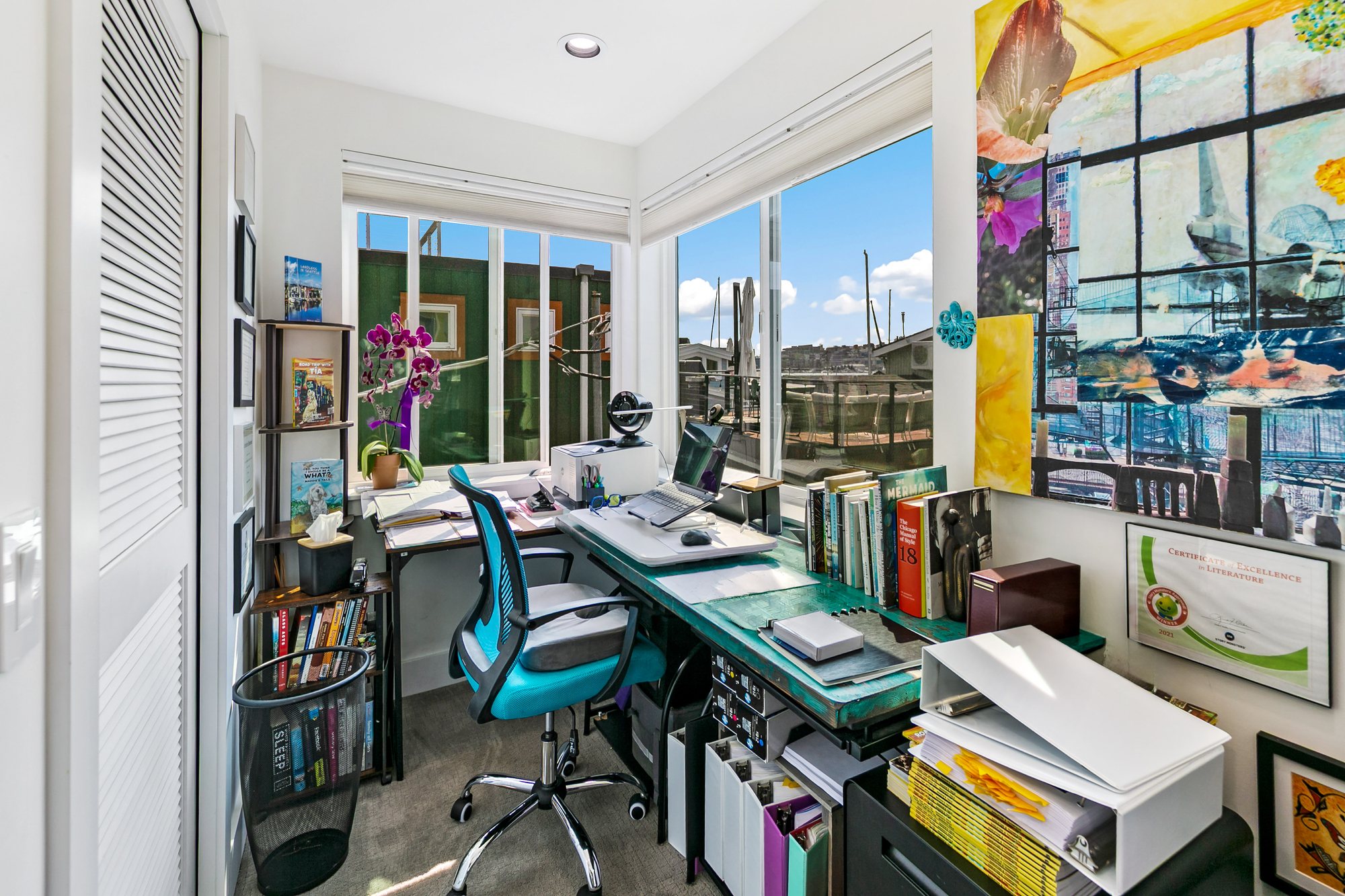 Compact home office overlooking the water