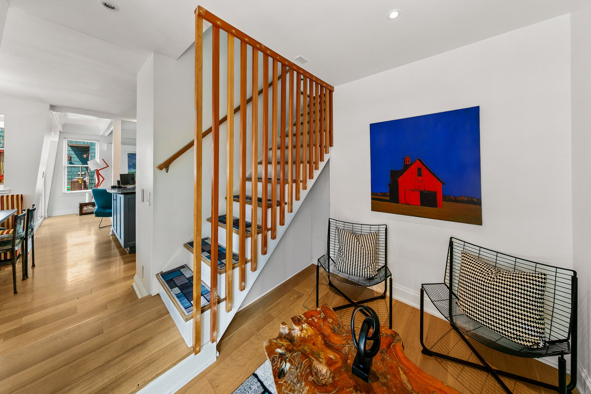 Open stair and hallway connecting the Floating Home interior