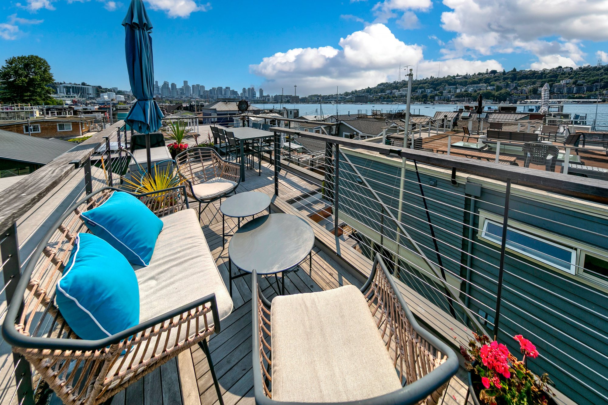 Rooftop lounge with broad Seattle water views
