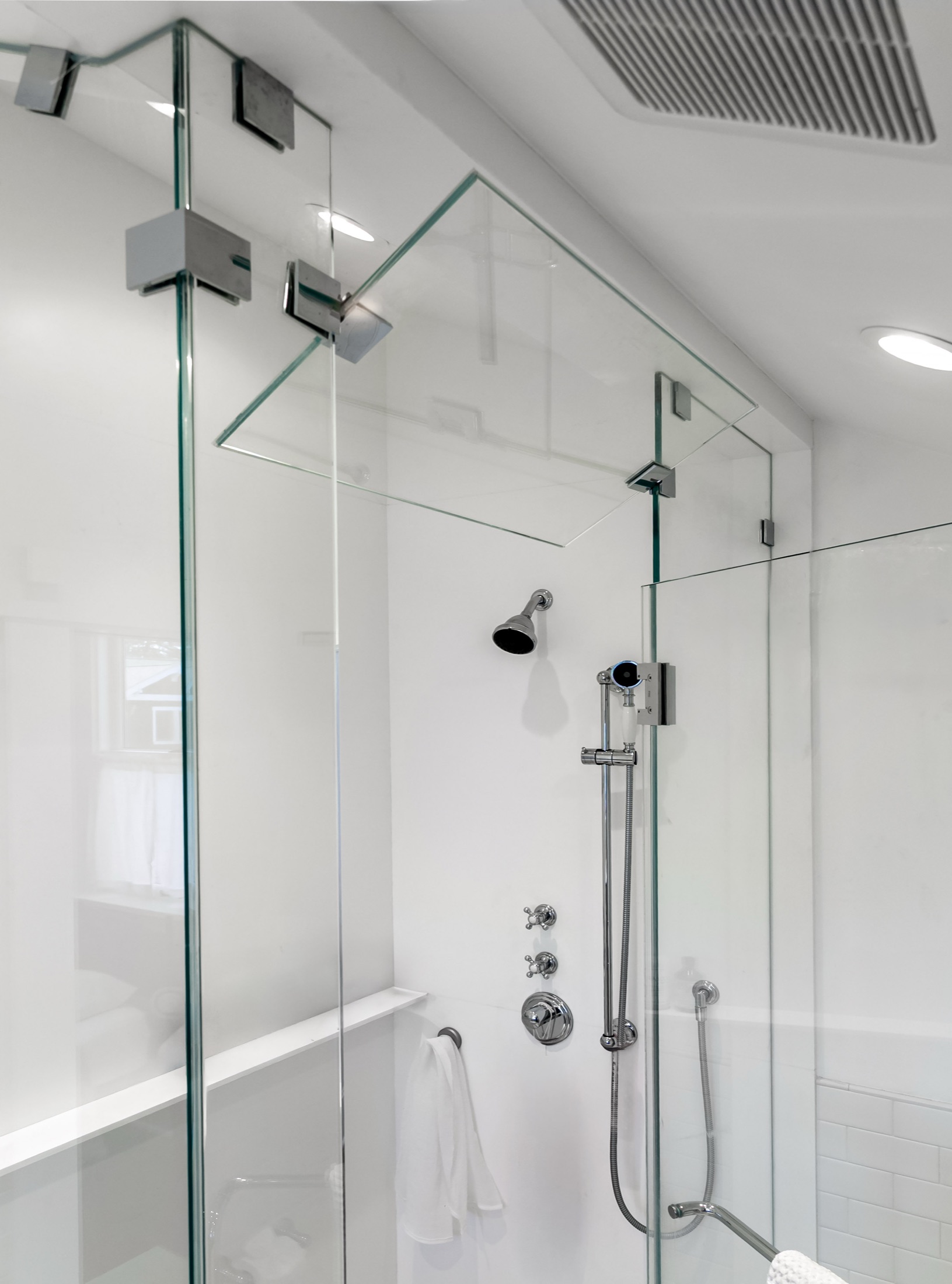 Frameless glass steam shower in the Madrona primary bath