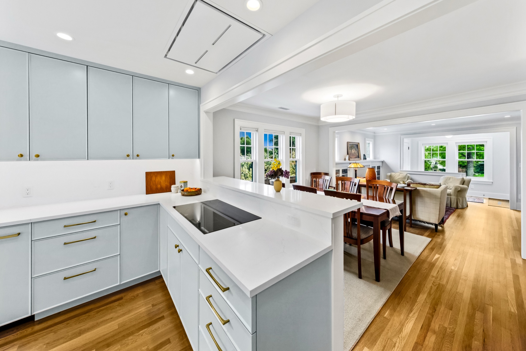 Kitchen opening toward the living and dining rooms